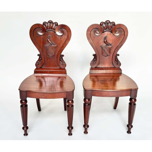 108 - HALL CHAIRS, a pair, George III English Country House mahogany with carved armorial backs and facett... 