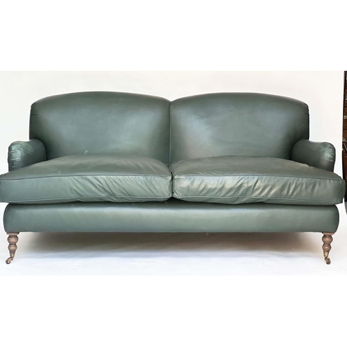 117 - HOWARD STYLE SOFA, natural soft green leather upholstered with turned supports, 95cm H x 210cm W x 1... 