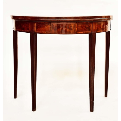 122 - TEA TABLE, George III period flame mahogany and tulipwood crossbanded demilune foldover with fluted ... 