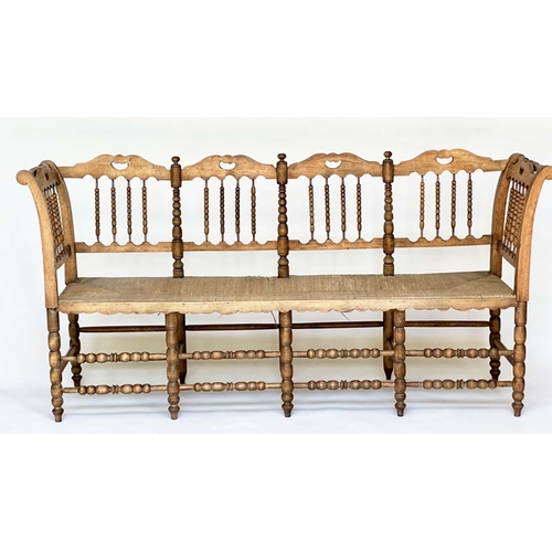 129 - HALL SEAT, 19th century English, William Morris style fruitwood with bobbin turned frame and rush se... 