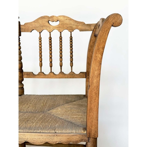 129 - HALL SEAT, 19th century English, William Morris style fruitwood with bobbin turned frame and rush se... 