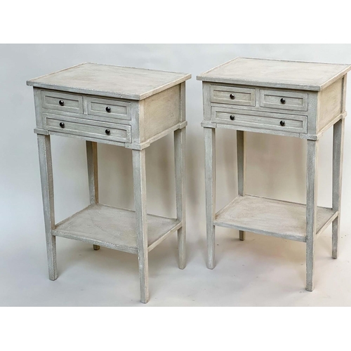 130 - BEDSIDE/LAMP TABLES, a pair, French style grey painted each with three drawers and undertier, 44cm W... 