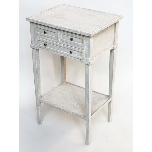 130 - BEDSIDE/LAMP TABLES, a pair, French style grey painted each with three drawers and undertier, 44cm W... 