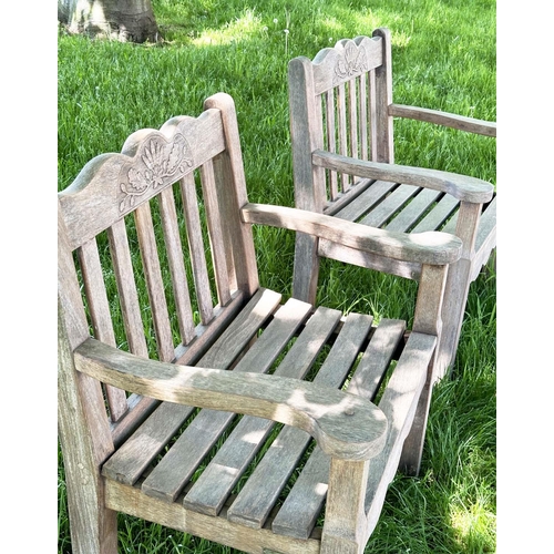 135 - GARDEN ARMCHAIRS BY BRIDGMAN & CO LTD, a pair, well weathered teak with generous seats, slatted back... 