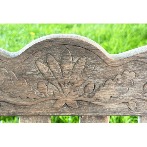 137 - GARDEN BENCH BY 'BRIDGMAN AND CO', well weathered teak slatted with shaped yoke and shaped flat top ... 