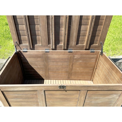 139 - GARDEN STORAGE TRUNK, outdoor weathered teak with hinged lid and side handles, 85vm H x 138cm W x 70... 