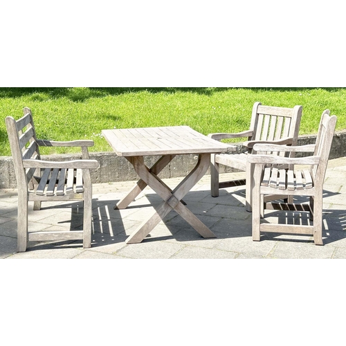 140 - GARDEN SET BY WOODFERN, well weathered teak with substantial X frame table, 72cm H x 152cm W x 86cm ... 