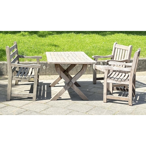 140 - GARDEN SET BY WOODFERN, well weathered teak with substantial X frame table, 72cm H x 152cm W x 86cm ... 