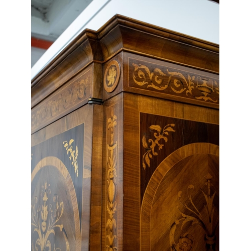 221 - WARDROBE, Italian walnut and marquetry of two doors enclosing a hanging rail and shelves, 211cm H x ... 