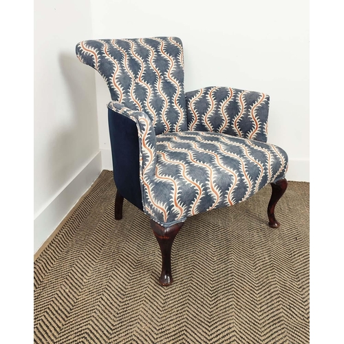 257 - ARMCHAIR, Edwardian upholstered in patterned fabric and navy blue velvet, 74cm H x 62cm.