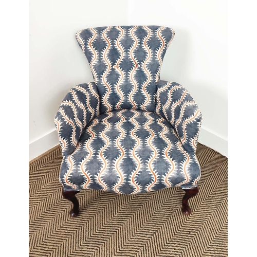 257 - ARMCHAIR, Edwardian upholstered in patterned fabric and navy blue velvet, 74cm H x 62cm.