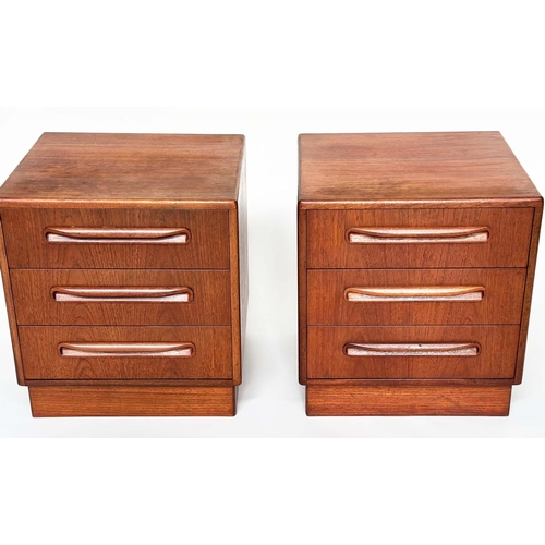 299 - G PLAN SIDE CHESTS, a pair, vintage 1970s teak, each with three drawers, reverse labels dated 1977, ... 