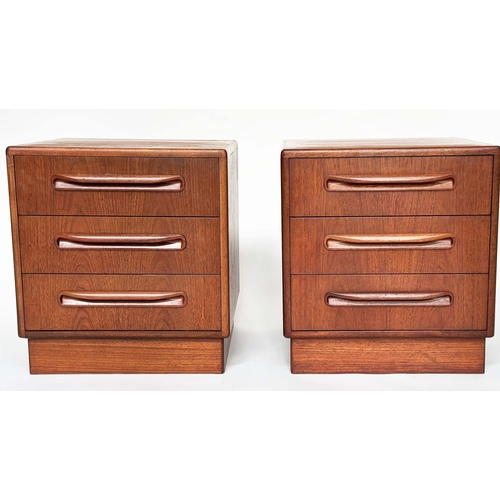 299 - G PLAN SIDE CHESTS, a pair, vintage 1970s teak, each with three drawers, reverse labels dated 1977, ... 