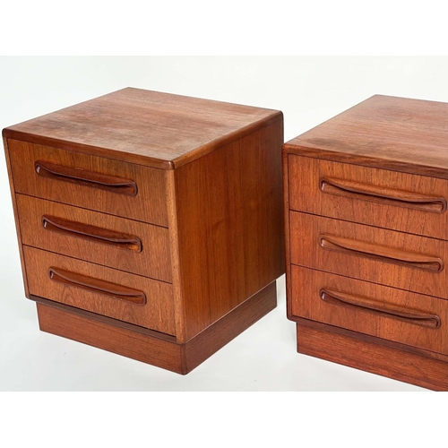 299 - G PLAN SIDE CHESTS, a pair, vintage 1970s teak, each with three drawers, reverse labels dated 1977, ... 