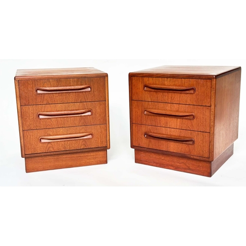 299 - G PLAN SIDE CHESTS, a pair, vintage 1970s teak, each with three drawers, reverse labels dated 1977, ... 