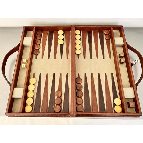 383 - BACKGAMMON SET, in leathered case, complete with counters, 7cm x 23cm x 40cm.