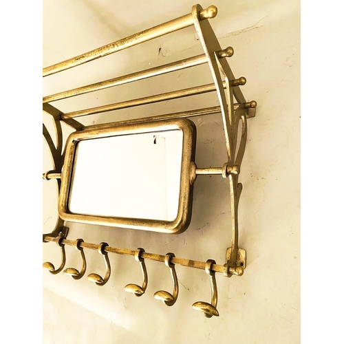 385 - WALL MOUNTING LUGGAGE RACK, rotating mirror and coat hooks, gilt metal, 54cm x 67cm x 36cm.