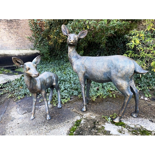 386 - SCULPTURAL DOE AND FAWN, resin in faux bronze finish, 89cm x 80cm x 35cm doe, 62cm x 53cm x 25cm faw... 