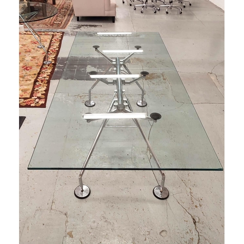 395 - NOMOS TABLE, with a rectangular glass top on pad footed base, 100cm D x 220cm L x 75cm H.