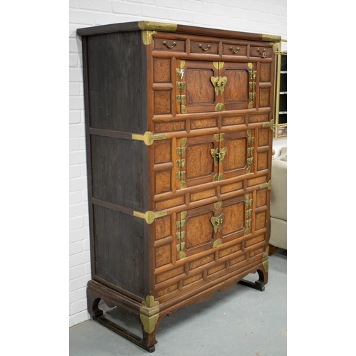 97 - CABINET ON STAND, 19th century Korean burr elm, elm and brass mounted with four drawers above six do... 