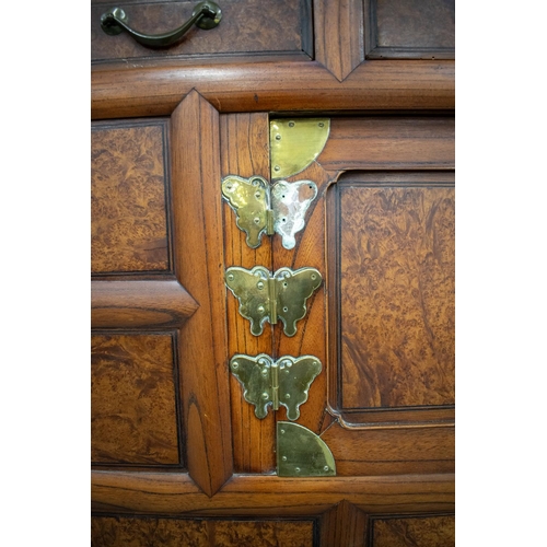 97 - CABINET ON STAND, 19th century Korean burr elm, elm and brass mounted with four drawers above six do... 