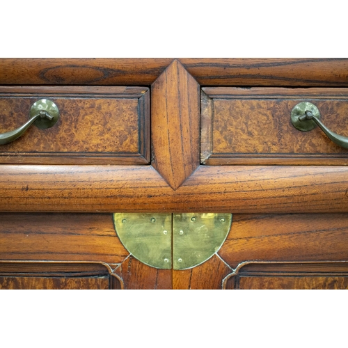 97 - CABINET ON STAND, 19th century Korean burr elm, elm and brass mounted with four drawers above six do... 