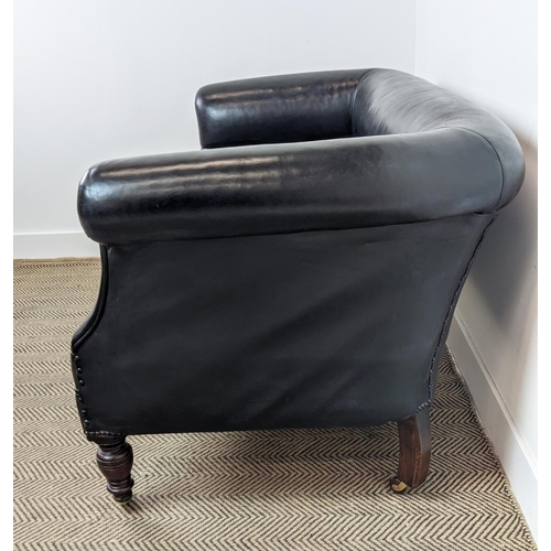 156 - CHESTERFIELD SOFA, Victorian mahogany in black leather on ceramic castors, 76cm H x 157cm x 82cm.