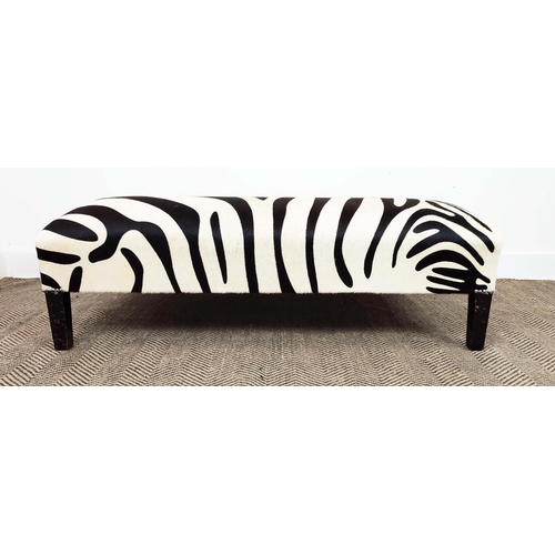 171 - HEARTH STOOL, rectangular zebra skin on ebonised legs, 40cm H x 120cm x 76cm.