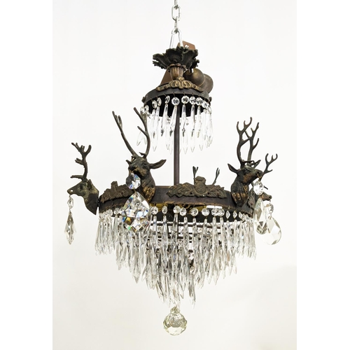 176 - CHANDELIER, gilt metal with stag heads, glass drops and six lights, 53cm W x 85cm H overall.