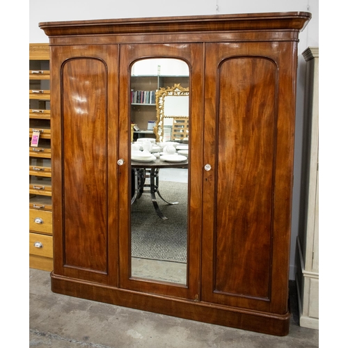 253 - WARDROBE, Victorian mahogany with mirrored door flanked by panel doors enclosing hanging rail and dr... 