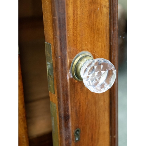 253 - WARDROBE, Victorian mahogany with mirrored door flanked by panel doors enclosing hanging rail and dr... 