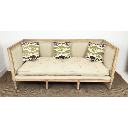 268 - SOFA, Louis XVI style bleached cherrywood in neutral upholstery with squab and scatter cushions on c... 