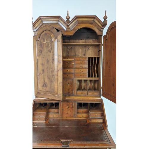 178 - BUREAU CABINET, George II style yewwood and stellar inlaid with three finials over panelled doors wi... 