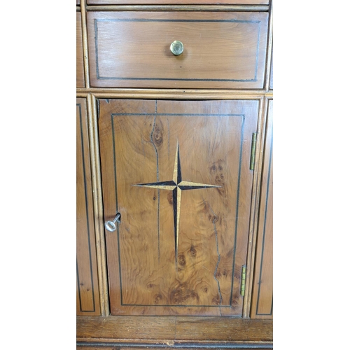 178 - BUREAU CABINET, George II style yewwood and stellar inlaid with three finials over panelled doors wi... 