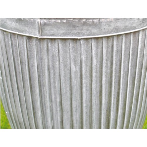 403 - PLANTERS, a graduated set of three, in ribbed galvanised metal, largest 50cm H x 45cm x 45cm. (3)