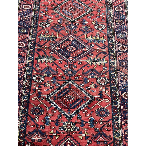 100A - ANTIQUE HERIZ RUNNER, 430cm x 117cm.