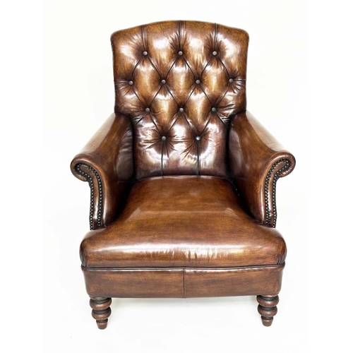 119 - LIBRARY ARMCHAIR, Club style antiqued soft tan brown leather with buttoned back and turned supports,... 