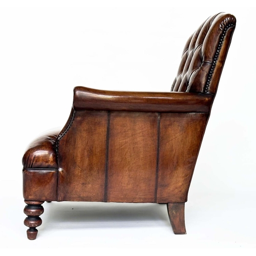 119 - LIBRARY ARMCHAIR, Club style antiqued soft tan brown leather with buttoned back and turned supports,... 