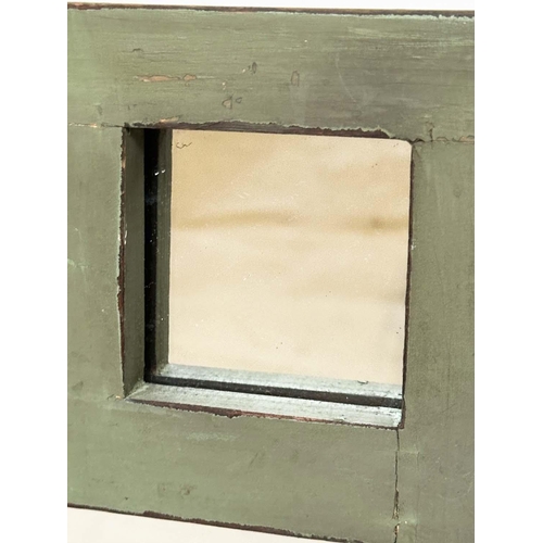 123 - WALL MIRROR, Art Deco green framed with marginal plates, 107cm H x 76cm W.