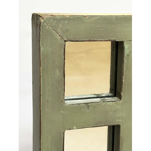 123 - WALL MIRROR, Art Deco green framed with marginal plates, 107cm H x 76cm W.