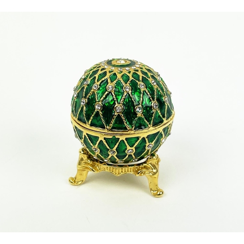 26 - RUSSIAN STYLE EGGS, four comprising a green hand cut glass, St Petersburg Russian egg with gilt high... 