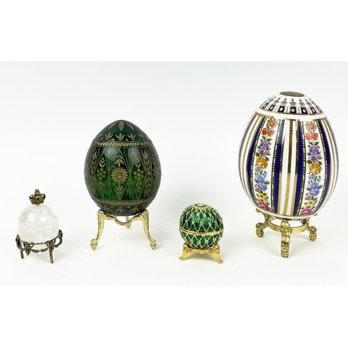 26 - RUSSIAN STYLE EGGS, four comprising a green hand cut glass, St Petersburg Russian egg with gilt high... 