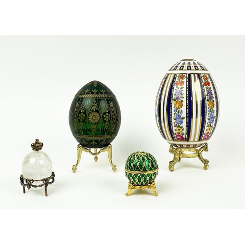 26 - RUSSIAN STYLE EGGS, four comprising a green hand cut glass, St Petersburg Russian egg with gilt high... 