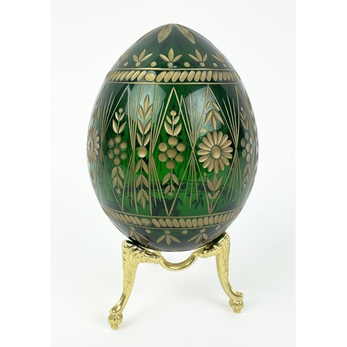 26 - RUSSIAN STYLE EGGS, four comprising a green hand cut glass, St Petersburg Russian egg with gilt high... 