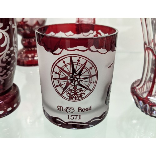 10A - QUANTITY OF BOHEMIAN CUT GLASS, mostly red, comprising various drinking glasses, bowls, water jug an... 