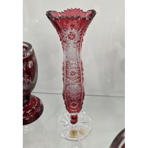 10A - QUANTITY OF BOHEMIAN CUT GLASS, mostly red, comprising various drinking glasses, bowls, water jug an... 