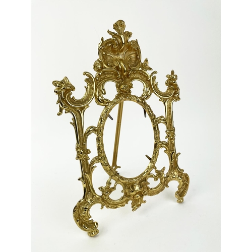 29 - PICTURE FRAMES, a pair, Rococo style, gilt metal, 35cm H x 23cm W. (2)