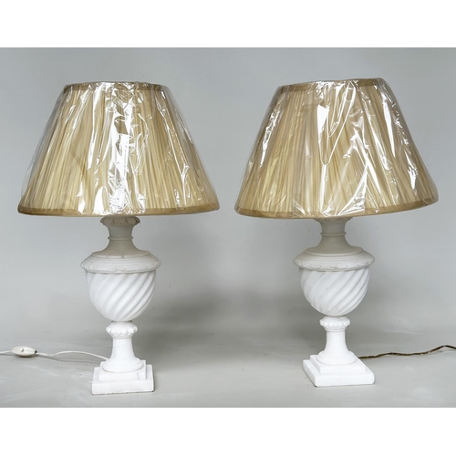 435 - TABLE LAMPS, a pair, Italian alabaster of spiral urn form with stepped square bases and shades, 66cm... 