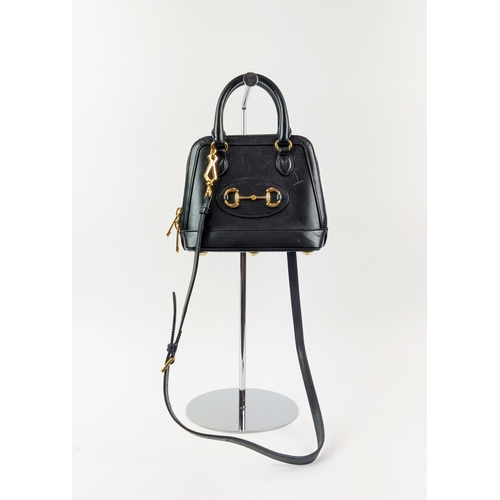 23 - GUCCI 1955 HORSEBIT MINI TOP HANDLE BAG, black leather with gold tone hardware, fabric lining, all a... 