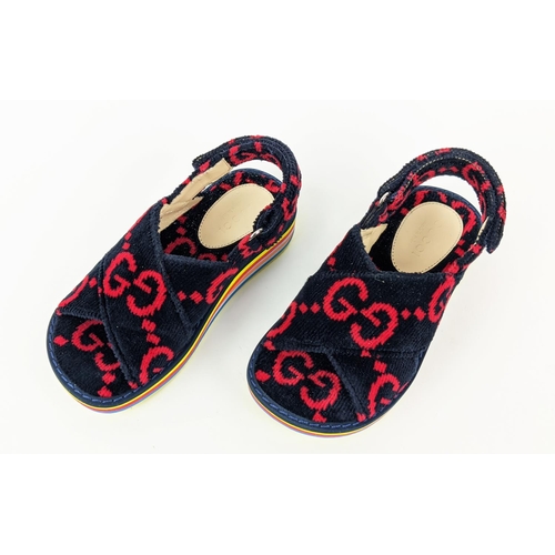 44 - GUCCI CHILDREN TOWELLING SANDALS, monogrammed, with slingback velcro strap closure, rubber rainbow s... 